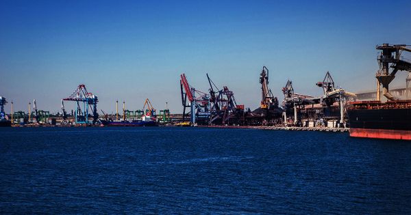 Cargo ships are docked in the Port of Pivdenny, Ukraine