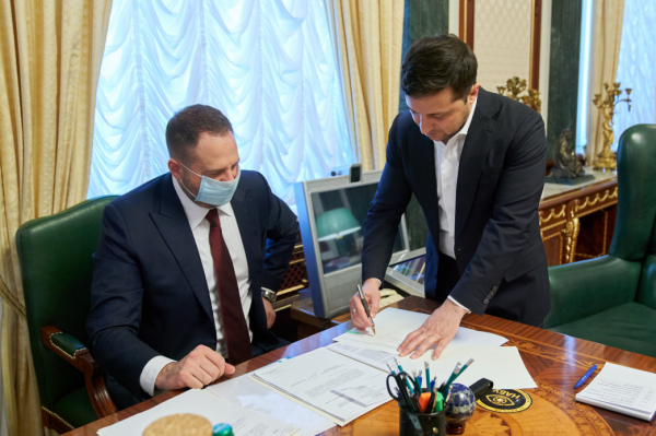 President of Ukraine Volodymyr Zelenskiy is signing the Land Turnover Law
