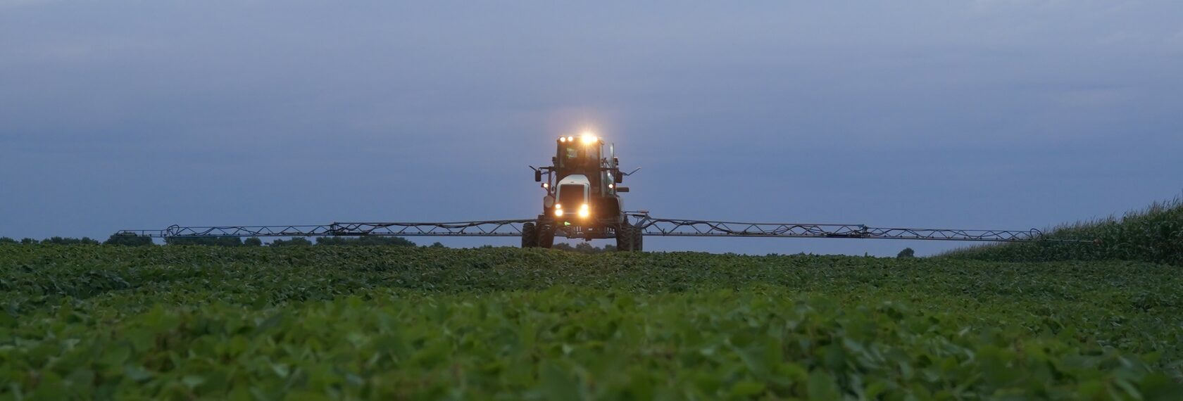A self-propelled sprayer treating soybean field of A.G.R. Group