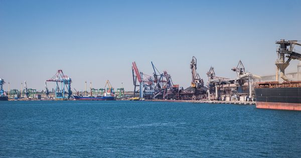 Grain transshipment in the port of Pivdenny, Ukraine