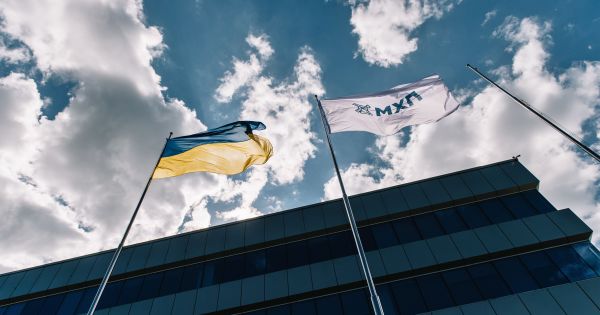 Ukraine's and MHP's flags in front of MHP's head office in Kyiv, Ukraine