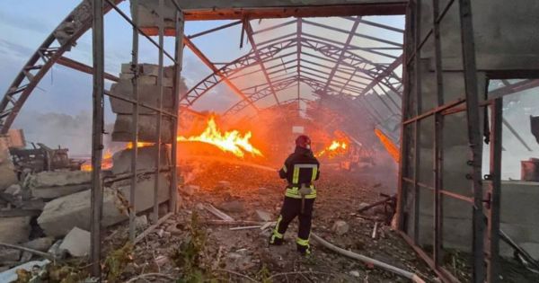 A firefighter extinguishes the fire in one of the farms in Izmail district of Odesa region, Ukraine, after another attack by russia on September 4, 2023