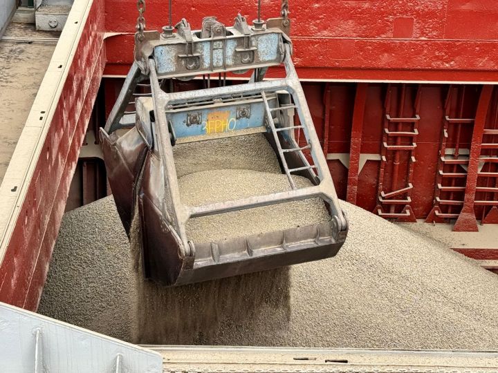 Grain is loaded onto a ship in one of Ukraine's sea ports