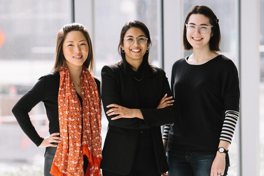 Erin Kim (L) with colleagues